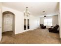 Spacious living room with carpeted floor at 1351 Venezia Ct # 304, Davenport, FL 33896