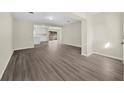 Bright and airy living room with hardwood floors at 16247 Lake Johns Cir, Winter Garden, FL 34787