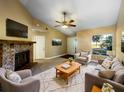 Cozy living room featuring a fireplace and ample seating at 511 Cloudcroft Dr, Deltona, FL 32738