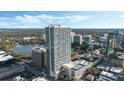 Stunning aerial view of the Vue Condo tower at Lake Eola, showcasing the building's height and surrounding cityscape at 150 E Robinson St # 3104, Orlando, FL 32801
