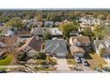 Aerial view of houses in a residential neighborhood at 3204 Oakstand Ln, Orlando, FL 32812