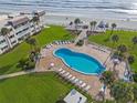 Relaxing poolside view steps away from the beach at 3663 S Atlantic Ave # 11D, New Smyrna Beach, FL 32169
