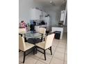 Kitchen with granite counters and breakfast table at 155 N Pearl Lake Cswy # 200, Altamonte Springs, FL 32714