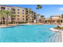 Large resort-style pool with plenty of lounge chairs at 8801 Worldquest Blvd, Orlando, FL 32821