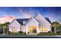 Charming two-story home featuring a black metal roof and white brick and wood siding at 1443 Ridgeback Ln, Apopka, FL 32703