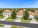 Aerial view of residential neighborhood with similar houses at 2549 Archfeld Blvd, Kissimmee, FL 34747