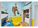 Fun ' bedroom with bunk beds and Minion decor at 2610 Autumn Creek Cir, Kissimmee, FL 34747