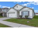 Charming one-story house with a two-car garage and attractive landscaping at 3101 Royal Tern Dr, Winter Haven, FL 33881