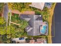 An aerial view of a house with a pool and a large backyard at 4832 Shoreline Cir, Sanford, FL 32771