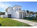 Contemporary home with sleek design and spacious driveway at 830 W Canton Ave, Winter Park, FL 32789