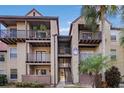 Two-story condo building with balconies and a staircase during the day at 236 Afton Sq # 103, Altamonte Springs, FL 32714