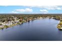 Aerial view of the neighborhood showcases the lake and community at 116 Sheridan Ave, Longwood, FL 32750