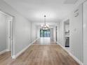 Dining room with hardwood floors and a large mirror at 30 Sheoah Blvd # 18, Winter Springs, FL 32708