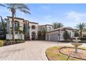 Grand two-story home with three car garage and fountain at 4326 Isabella Cir, Windermere, FL 34786