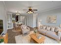 Bright living room with comfy seating and a dining area at 914 Charo Pkwy # 112, Davenport, FL 33897