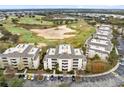 Aerial view of condo community near golf course at 1368 Centre Court Ridge Dr # 104, Reunion, FL 34747