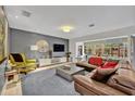 Open-concept living room with hardwood floors at 1901 Lake Sue Dr, Orlando, FL 32803