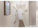 Bright and spacious entryway with tile flooring and neutral decor at 2220 Wyndham Palms Way, Kissimmee, FL 34747
