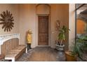 Inviting entryway with decorative accents and a wooden door at 38633 Lakeview Walk, Lady Lake, FL 32159