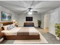 Large main bedroom with ensuite bathroom and walk-in closet at 2943 Top Water Way, Kissimmee, FL 34746