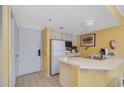 Small condo kitchen with appliances at 6403 Parc Corniche Dr # 4309, Orlando, FL 32821