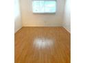 Bright bedroom with wood-look flooring at 920 Lake Destiny Rd # F, Altamonte Springs, FL 32714