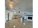 Bright kitchen with light-colored cabinets, granite countertops, and stainless steel appliances at 2700 Hoover Dr, Deltona, FL 32738