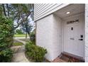 Home's entrance with walkway, landscaping and street view at 466 W Par St # 466, Orlando, FL 32804