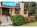 Front entrance with double doors and stone accents at 602 Iris St, Altamonte Springs, FL 32714