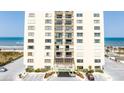 Ocean view high-rise building, showcasing its architectural design and beachfront location at 1513 Ocean Shore Blvd # 8F, Ormond Beach, FL 32176