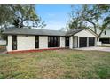 Stylish house featuring a modern facade and landscaping at 1523 N Beach St, Ormond Beach, FL 32174