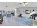 Modern kitchen with gray cabinets and stainless steel appliances at 20493 Majestic St, Orlando, FL 32833