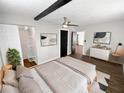 Main bedroom with walk-in closet, hardwood floors, and ceiling fan at 14421 Parker Rd, Orlando, FL 32832