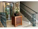 Beautiful lobby with staircase, floral arrangement, and stylish decor at 630 Vassar St # 2310, Orlando, FL 32804