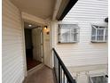 Condo hallway with light walls and an exterior door at 1972 Lake Atriums Cir # 199, Orlando, FL 32839