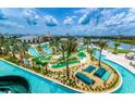 Aerial view of resort amenities including lazy river and mini golf at 3151 Paradox Cir # 405, Kissimmee, FL 34746