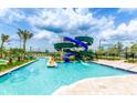 Enjoy the resort-style pool with waterslide at 3151 Paradox Cir # 405, Kissimmee, FL 34746