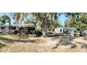 Property includes a mobile home, detached shed, and large yard at 475 80 Foot Rd, Bartow, FL 33830