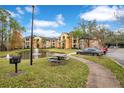 Apartment community features a pond, picnic area, and BBQ at 814 Crest Pines Dr # 937, Orlando, FL 32828