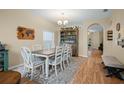 Spacious dining room features a large table, perfect for Gathering gatherings at 15208 Stonebriar Way, Orlando, FL 32826