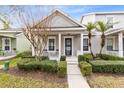 Charming house with a front porch and neatly landscaped yard at 3721 Cleary Way, Orlando, FL 32828