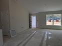 Bright living room featuring an open floor plan and lots of natural light at 5 Emerald Trl, Ocala, FL 34472