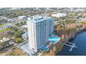 High-rise condo building and pool with lake access at 13427 Blue Heron Beach Dr # 1001, Orlando, FL 32821