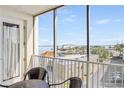 Condo balcony with water views and outdoor seating at 225 W Seminole Blvd # 412, Sanford, FL 32771