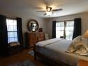 Spacious main bedroom with hardwood floors and large windows at 749 E Yorkshire Dr, Deland, FL 32724