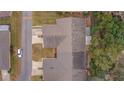 Top-down view of condo building highlighting roofline and landscaping at 10738 Se 50Th Ave, Belleview, FL 34420