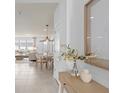 Bright and airy entryway with light flooring and neutral colors at 11175 Rising Sun St, Orlando, FL 32829
