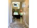 Bright entryway with tiled floor, leading to living area at 121 Wimbledon Cir, Lake Mary, FL 32746