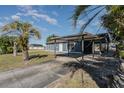 Home exterior showcasing carport and landscaping at 2841 W Covington Dr, Deltona, FL 32738