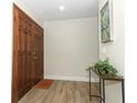 Bright entryway with hardwood floors and a console table at 1710 Aster Dr, Winter Park, FL 32792